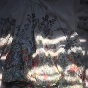 A cute white blouse with floral